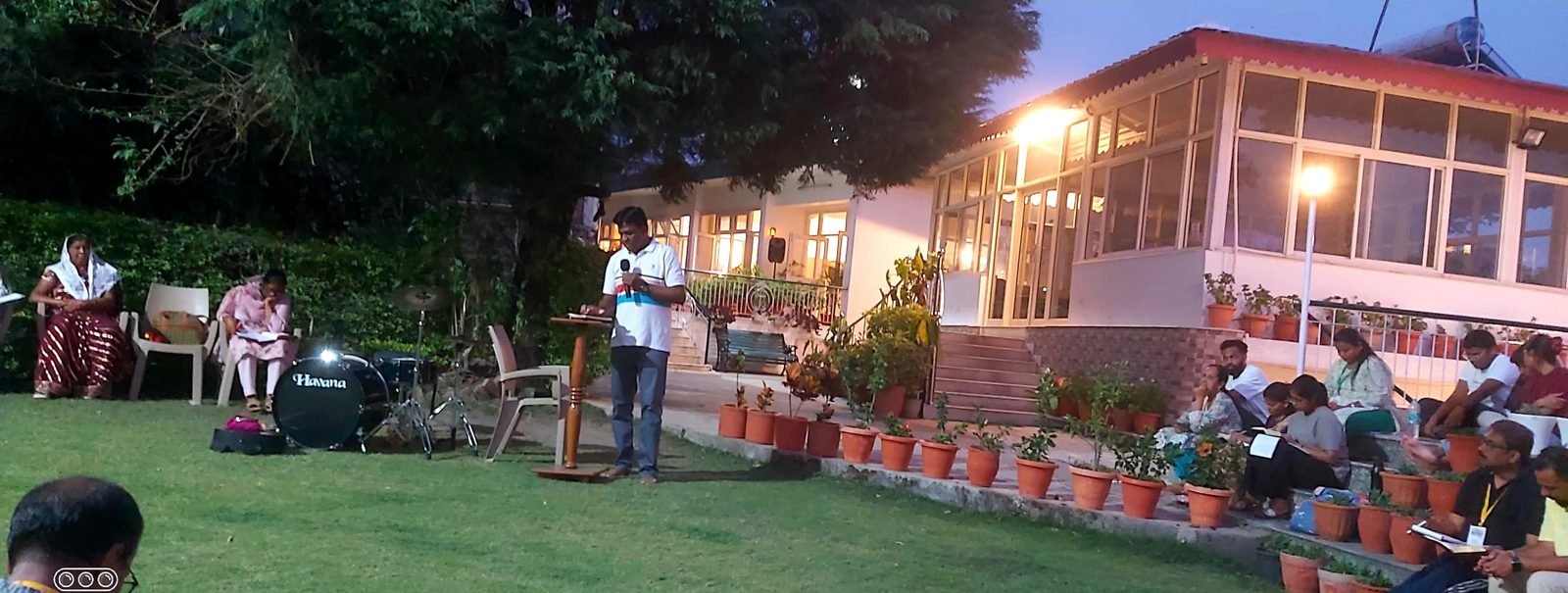 An evening gathering at family camp